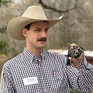 Tripp Morgan discussing animal ID.JPG thumbnail